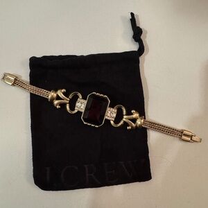 J crew bracelet with purple center stone
